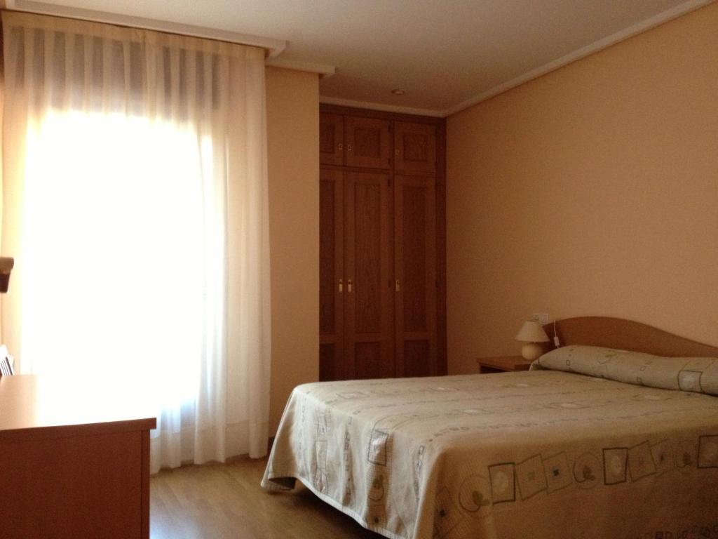 Apartamentos Turisticos Puerta de León Quarto foto