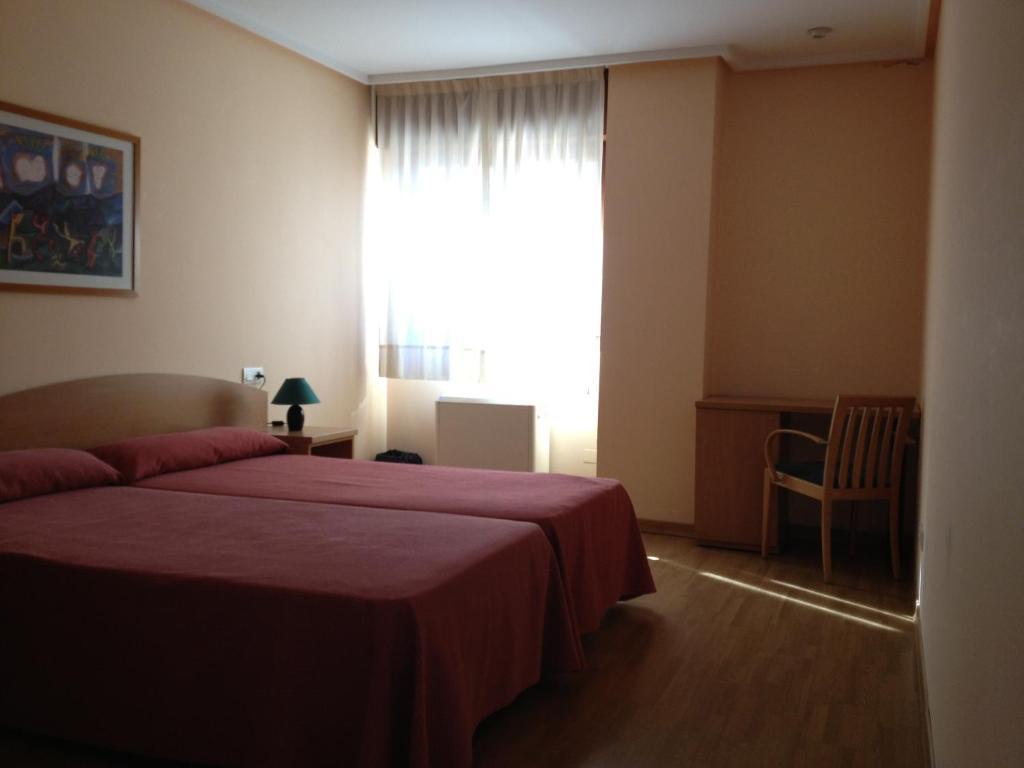 Apartamentos Turisticos Puerta de León Quarto foto